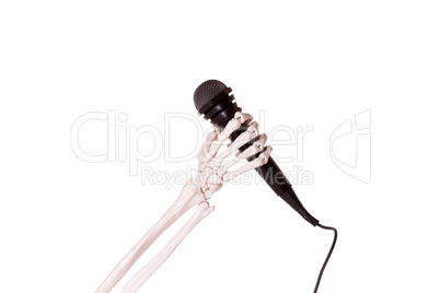skeleton hand holding microphone