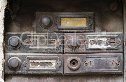 old and damaged doorbells - buttom