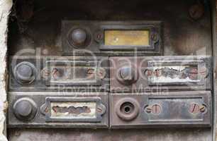 old and damaged doorbells - buttom