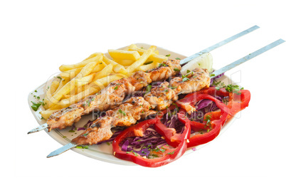 shish kebab on skewers with chips