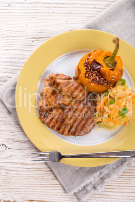 Steak with rice stuffed peppers