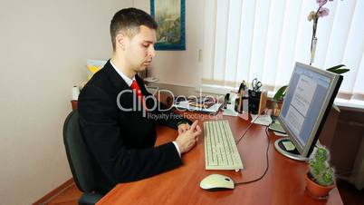Man Begins Typing Documents