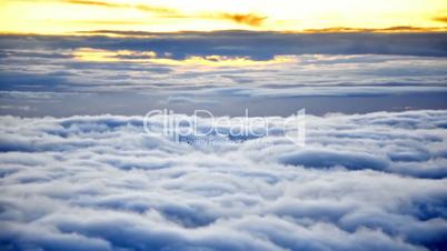 Aerial over Europa at sunrise View of earth atmosphere and clouds over land at dusk London city lights before Luthon landing