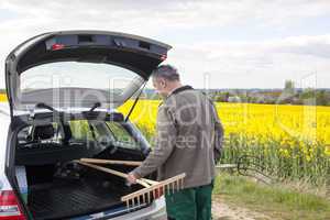 Farmer invites tools in his car