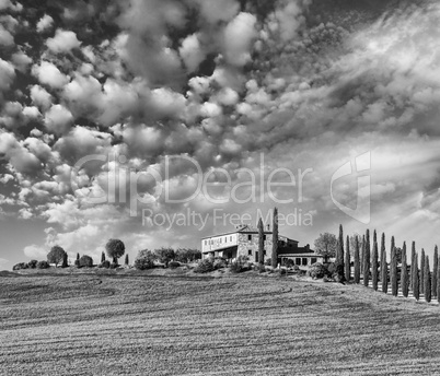 Tuscany - Landscape panorama, hills, meadow and old farm, Toscan