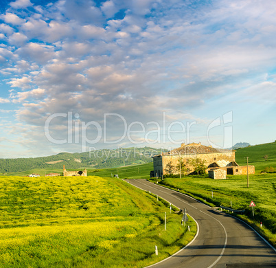 Tuscany - Landscape panorama, hills, meadow and old farm, Toscan
