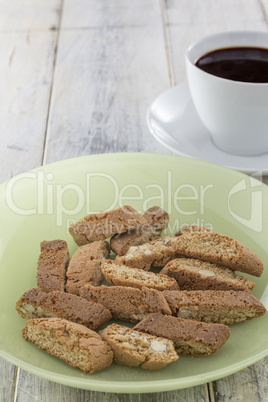 Biscotti on green plate