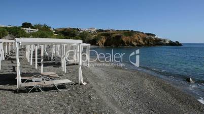 The huts on beach at luxury hotel, Crete, Greece