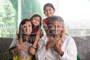 happy indian parents and children