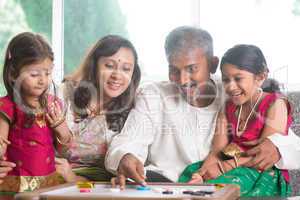 indian family playing carrom game