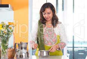 indian housewife preparing food