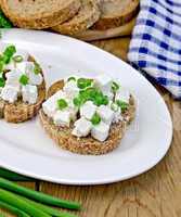 Bread with feta and chives on a plate