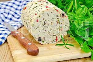 Cheese homemade with hot pepper and napkin on board