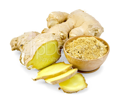 Ginger powder in wooden bowl with root