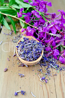Herbal tea from fireweed on wooden spoon