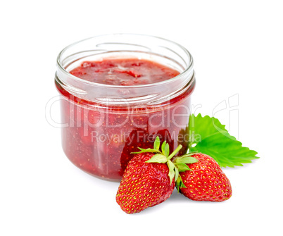 Jam of strawberry with berries and leaf