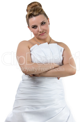 Woman in dress with arms crossed on her chest