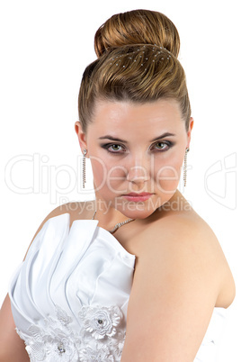 Woman in wedding dress looking at camera
