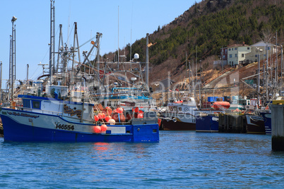 Fishing boats are moored in harbor ready for long weekend