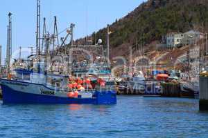 Fishing boats are moored in harbor ready for long weekend