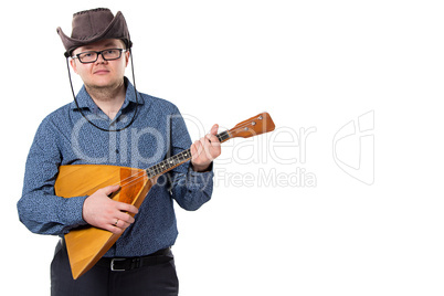 Man with balalaika in cowboy hat