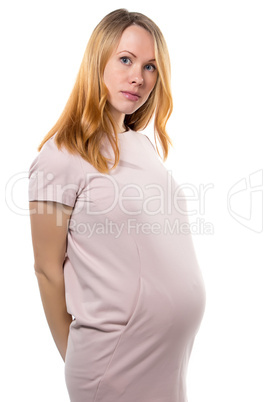 Pregnant woman with tummy standing