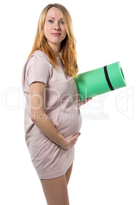 Pregnant woman with mat