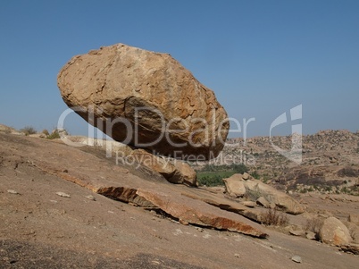 Balancing granite boulder