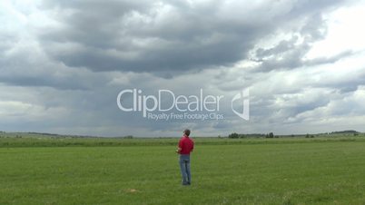 Man Launches RC Glider in the Sky, panoramic view