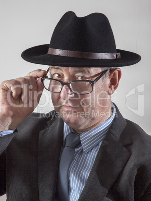 Serious men portrait with hat