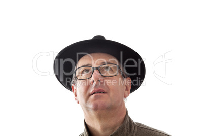 Serious man with hat and anxious glance