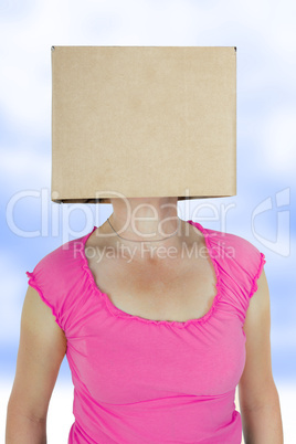 Woman has box with painted face on the head