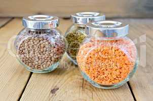 Lentils different in jars on the board