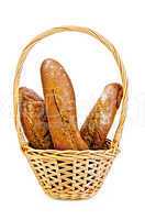 Rye baguettes in a wicker basket