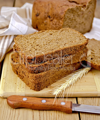 Rye homemade bread with spikelet on board