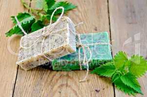 Soap homemade with nettle on the board