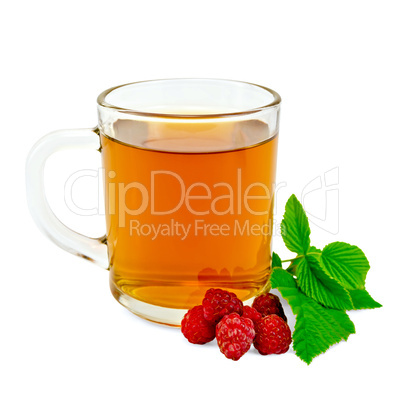 Tea with raspberry in glass mug