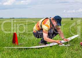 Man makes the assembly RC glider