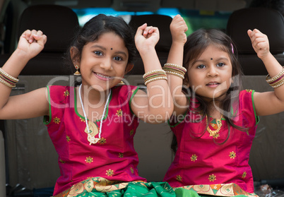 Indian girls sitting in car