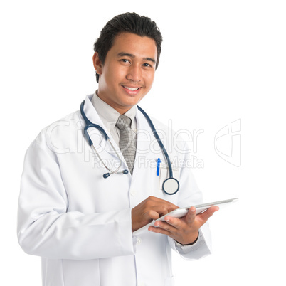 Southeast Asian medical doctor using tablet