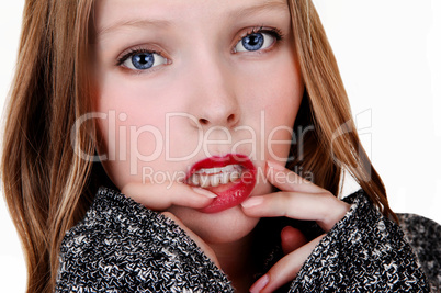 Girl with finger on lips.