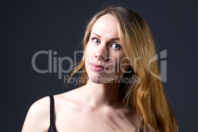 Portrait of beautiful girl with red hair