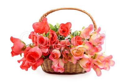 basket with colorful artificial flowers