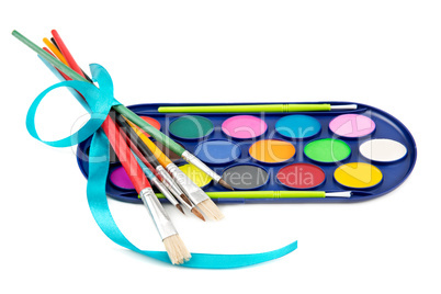 kit of watercolor paints and brushes for painting