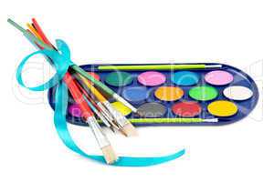 kit of watercolor paints and brushes for painting