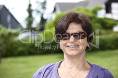 Woman portrait in green nature