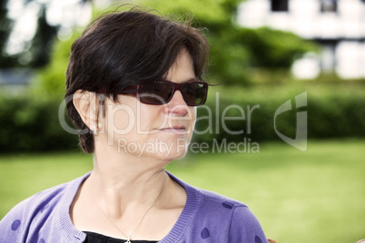 Woman portrait in green nature