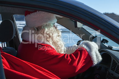 Portrait of Santa Claus in the car