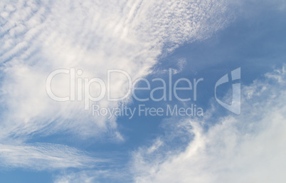 cirrus and cumulus clouds on blue sky