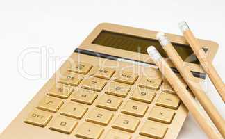 digital calculator and pencil